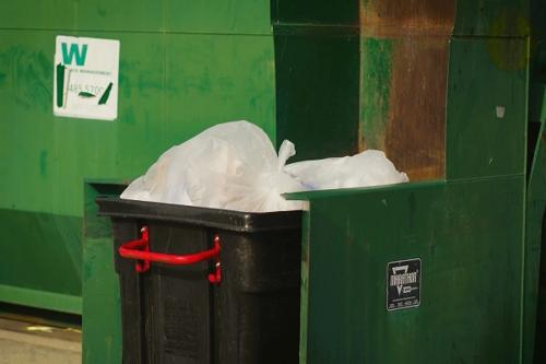 Maintaining the Dumpster and Recycle Area